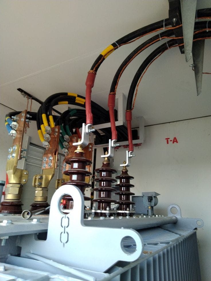 Transformer with medium-voltage cable terminations